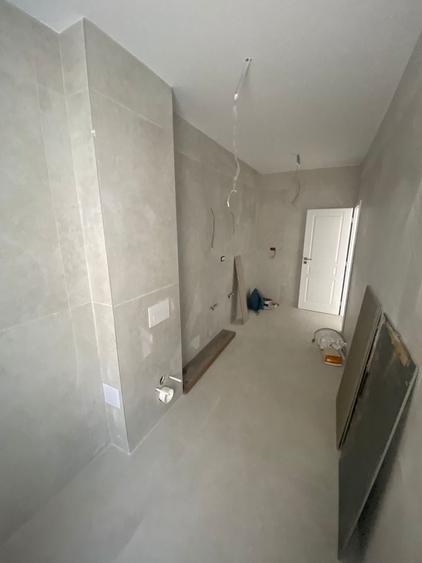 Nou.  62 mp utili. Gradina proprie 22 mp.. 3 parcari acoperite. Zona Braytim. - 16