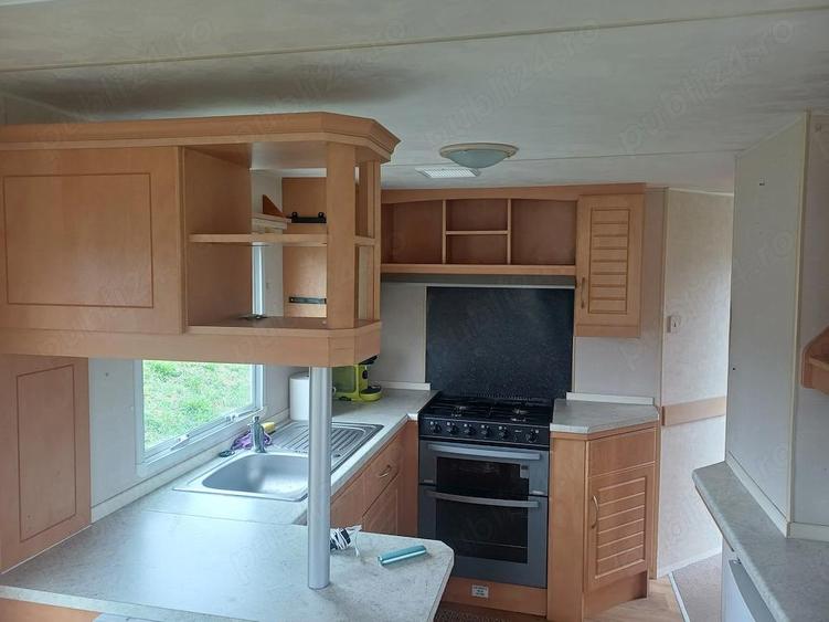 De vanzare casa pe roti , 3 dormitoare , 2 bai, living si bucatarie, mobilat utilat , pre? 21800 E - 4