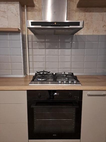 Apartament cu 2 camere, mobilat în Central