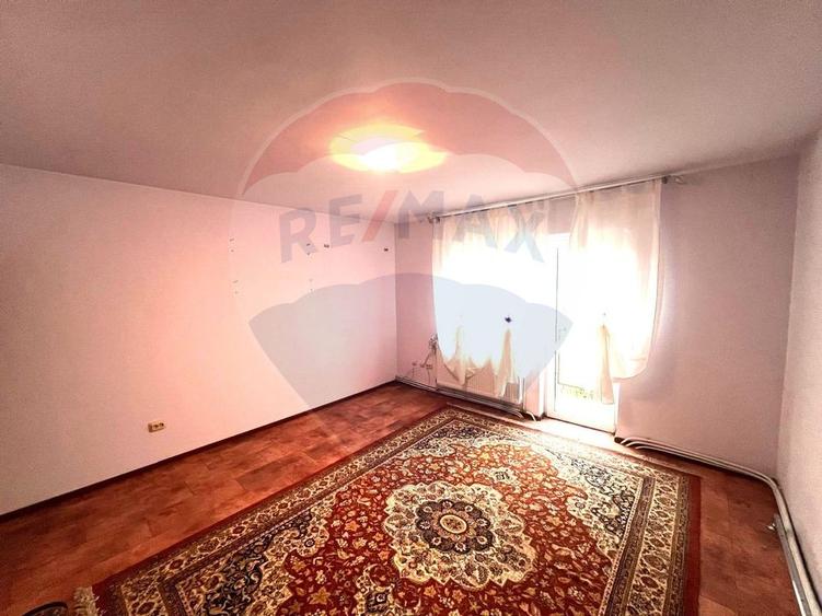 Apartament cu 3 camere de vânzare în comuna Răcăciuni - 4