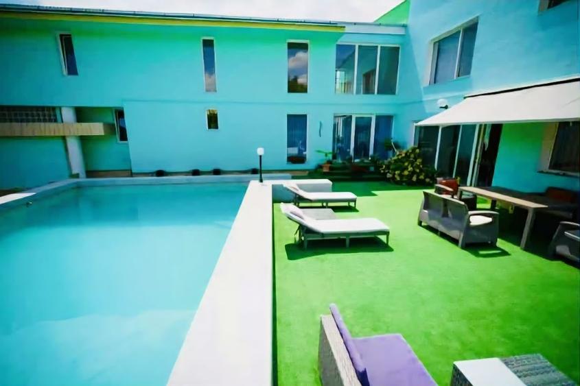 Casă individuală cu 7 camere cu Teren 1000 Mp în Girocului
