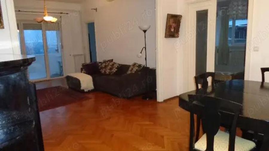 Apartament cu 4 camere, cu o suprafa?a utila de 105 m2, situat intre Pia?a Romana ?i Calea Victoriei - 10