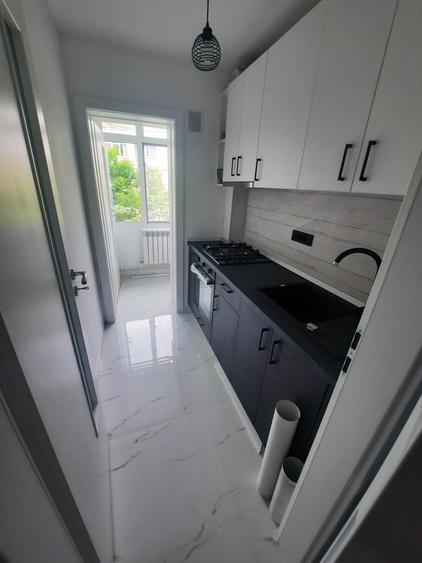 Apartament cu 2 camere, etajul 3/4, zona Podu Ros - 5