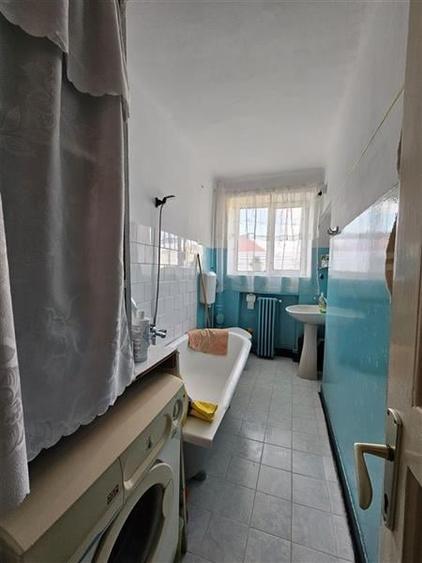 Apartament cu GRADINA SI ACOPERIS  MANSARDA DE VANZARE IN ONESTI ETJ 1 - 10