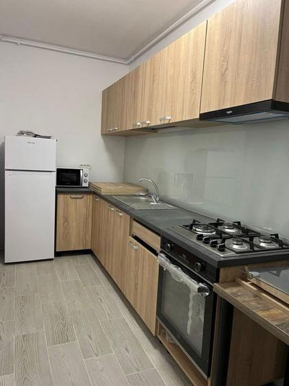 Inchiriez apartament cu o camera + living - 14