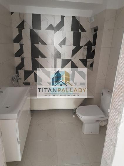 Apartament cu 4 camere decomandat în Titan