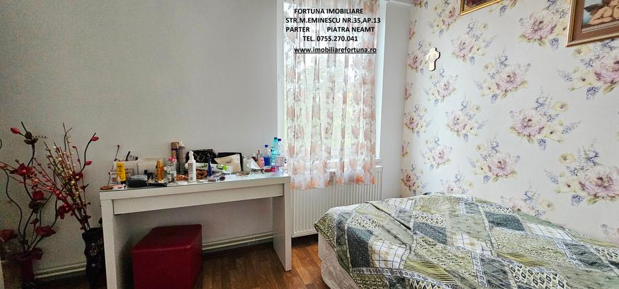 Locuinta individuala(apartament 4 camere)+spatiu comercial si teren ,Darmanesti - 11