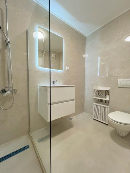 Apartament cu 3 camere, terasă de 26 mp și parcare subterană, Floresti - 11