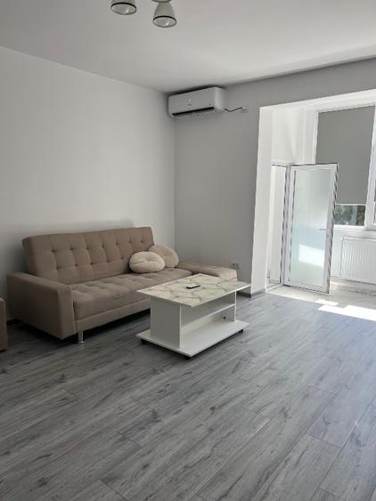 Apartament cu 2 camere semidecomandat, mobilat în Ultracentral
