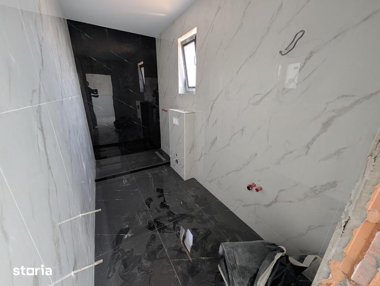Casă cu 5 camere cu Teren 511 Mp în Tunari