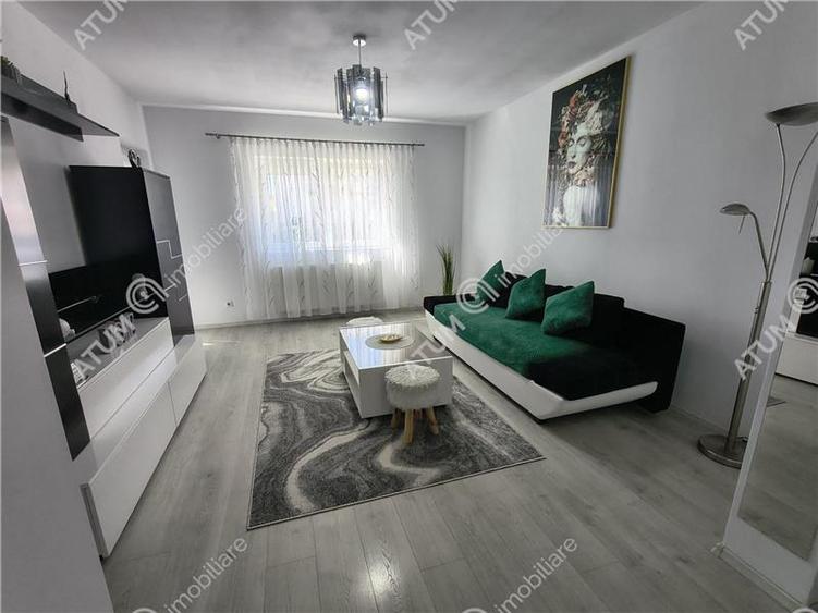 Apartament cu 2 camere decomandate balcon si loc de parcare etajul 1 - 1