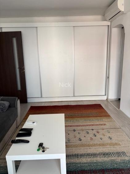 Apartament cu 2 camere decomandat în Arcul de Triumf