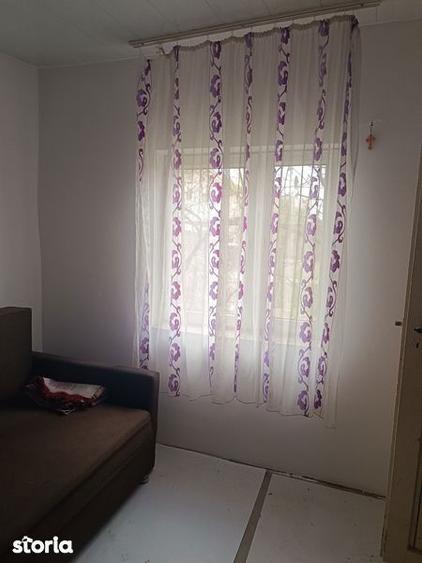 Casă cu 2 camere cu Teren 90 Mp în Bucu