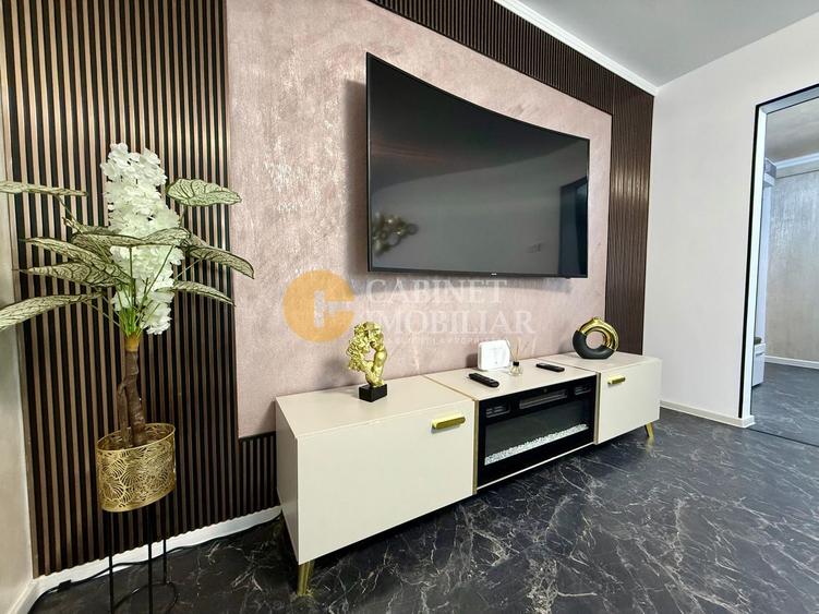 Apartament cu 2 camere semidecomandat, mobilat în Podu Roș