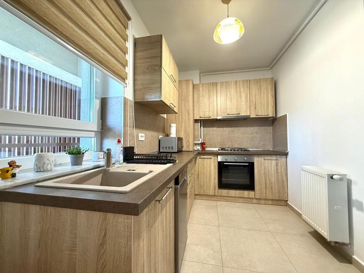 Apartament cu 2 camere, mobilat în Tractorul