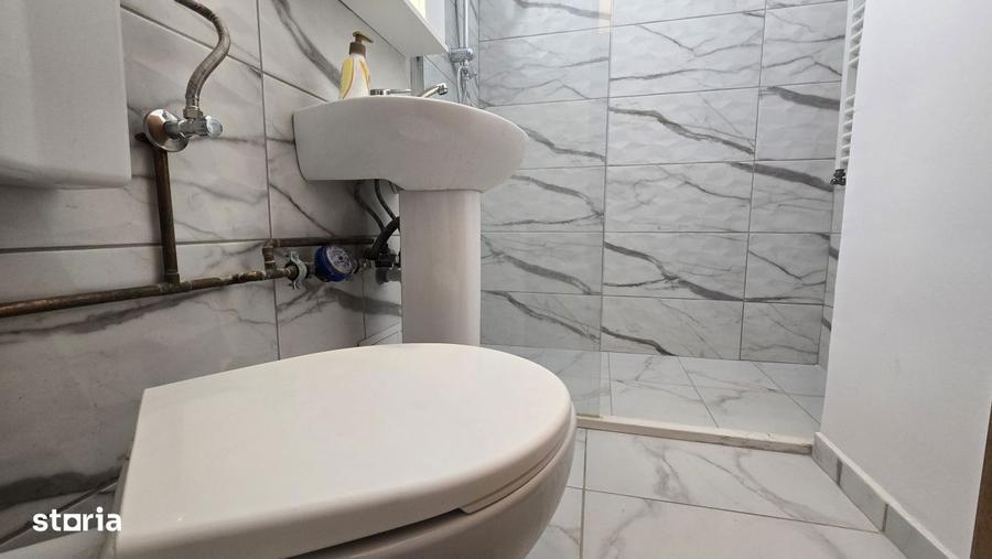Apartament cu 2 camere semidecomandat, mobilat în Central