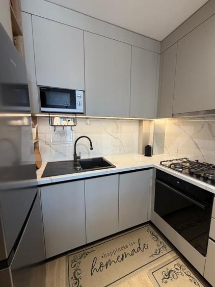 Apartament cu 2 camere decomandat, mobilat în Tractorul