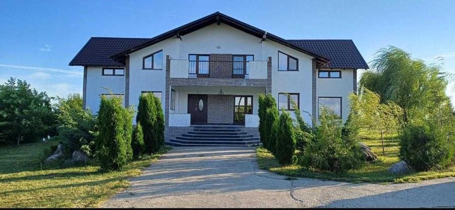 Casă cu 4 camere în Cotu Băii