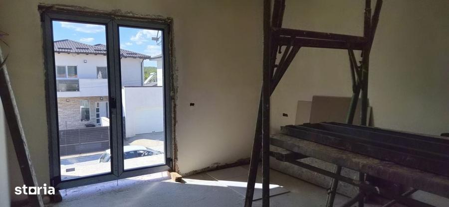 Casă cu 4 camere în Bascov