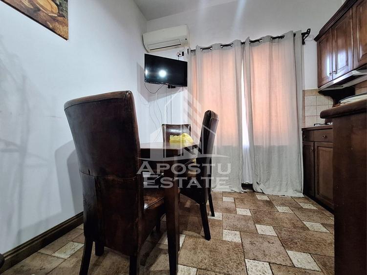 Apartament cu 2 camere semidecomandat, mobilat în Central
