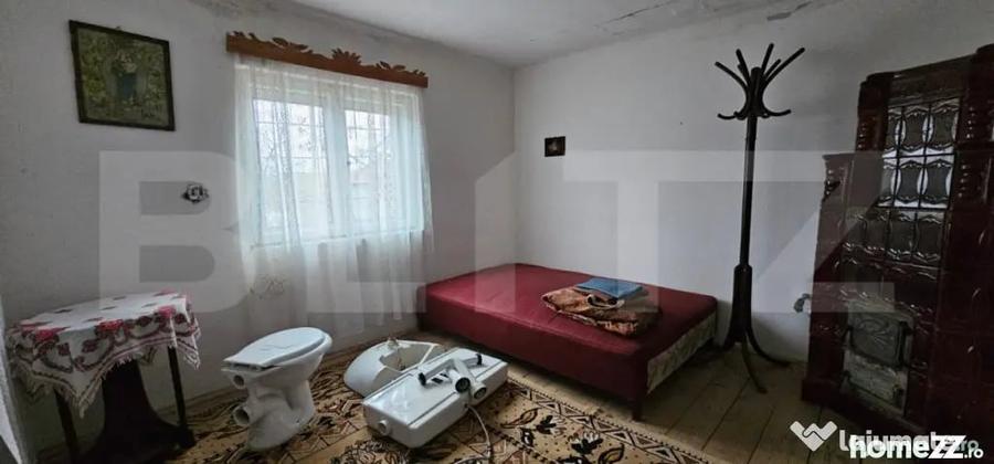 Casă cu 2 camere cu Teren 1200 Mp în Central