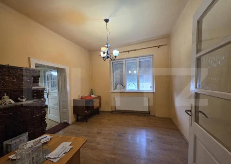 Casă cu 4 camere cu Teren 500 Mp în Titulescu