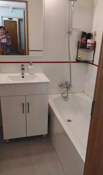 Apartament cu 3 camere semidecomandat, mobilat în Ozana