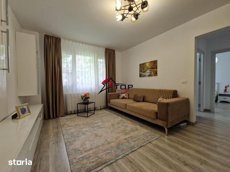 Apartament cu 2 camere semidecomandat, mobilat în Podu Roș