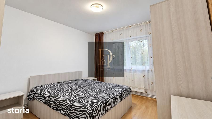 Apartament cu 3 camere decomandat în Tractorul