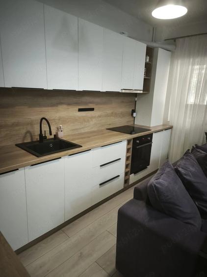 Apartament cu 3 camere semidecomandat în Europa