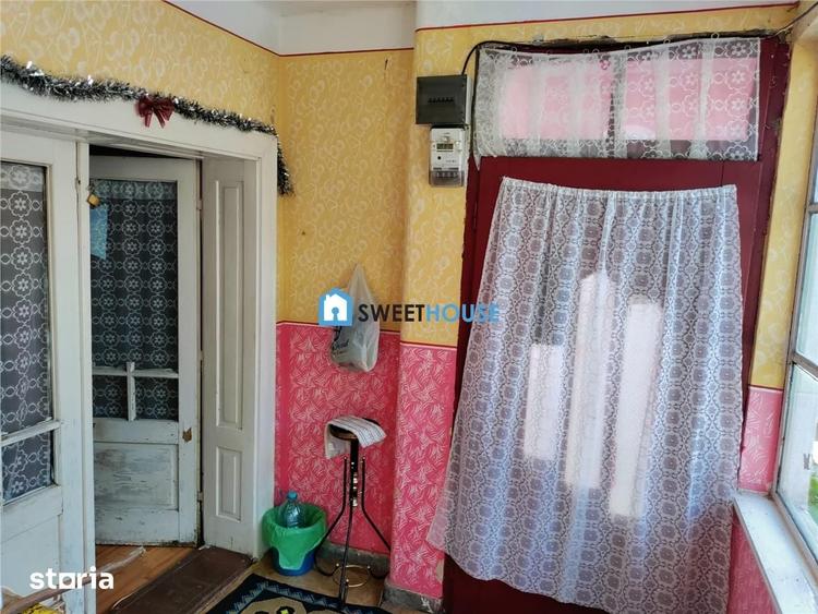 Casă cu 3 camere cu Teren 1250 Mp în Beclean