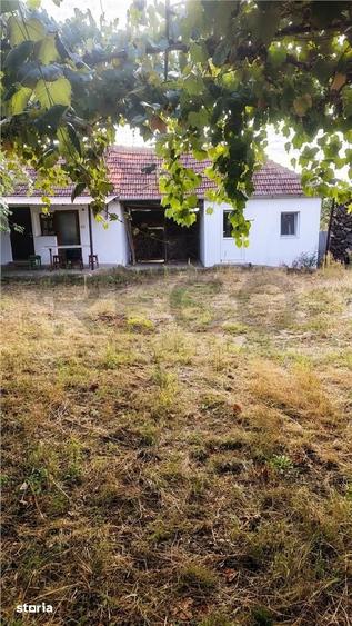 Casă cu 2 camere decomandat cu Teren 1742 Mp în Husasău de Tinca