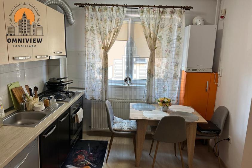 Apartament cu 2 camere decomandat în Tractorul