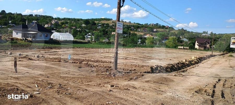 Teren intravilan ,1800mp, deschidere la DN, Rachiti