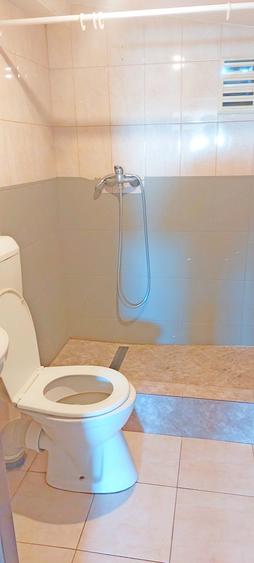Casă cu Teren 200 Mp în Central