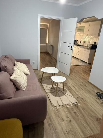 Apartament cu 2 camere semidecomandat, mobilat în Central