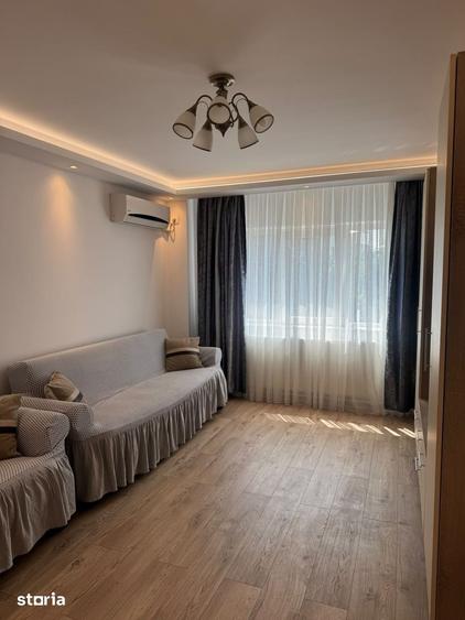 Inchiriere 3 camere, cu loc de parcare, totul nou - 11