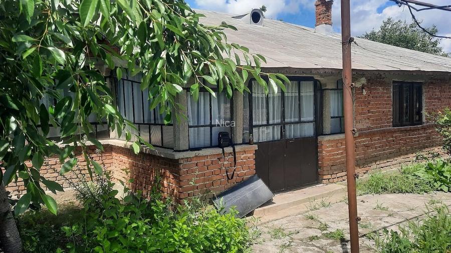 Casă cu 6 camere cu Teren 1500 Mp în Hulubești