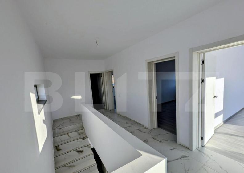 Casa moderna situata intr-o zona linistita, cu acces facil l - 6