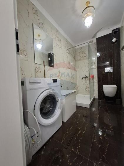 Apartament cu 3 camere  cu loc de parcare si curte proprie -de vanzare - 12