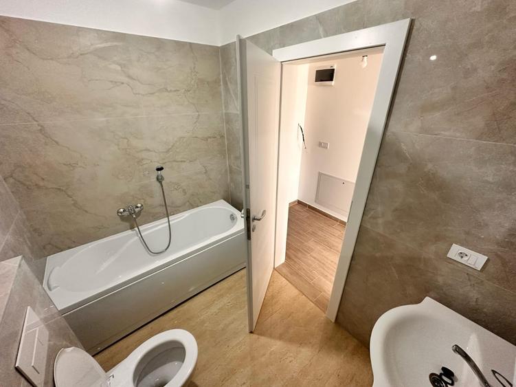Apartament tip penthouse cu balcon si terasa bloc nou - 4