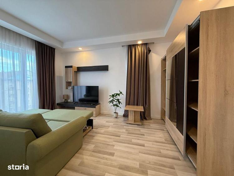 COSMOPOLIS - Garsoniera, mobilata si utila - 10