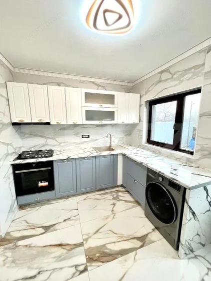 Lini?te, spa?iu ?i elegan?a casa superba langa Titu - 15