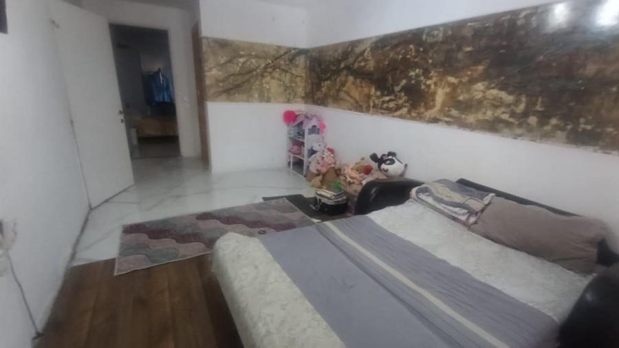 Casă cu 5 camere cu Teren 332 Mp în Central