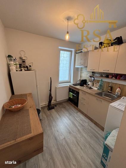 Garsoniera de vanzare etaj 1 zona Dovali Rm Valcea - 1