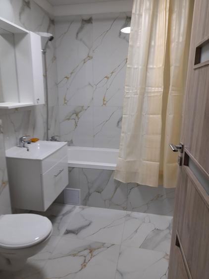 Proprietar inchiriez garsoniera in zona Popesti bloc nou 2026 - 4