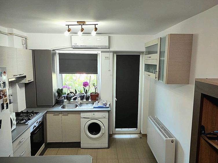 Apartament 2 camere cu parcare interioara Et.1 open space Bacau Tazlau - 3