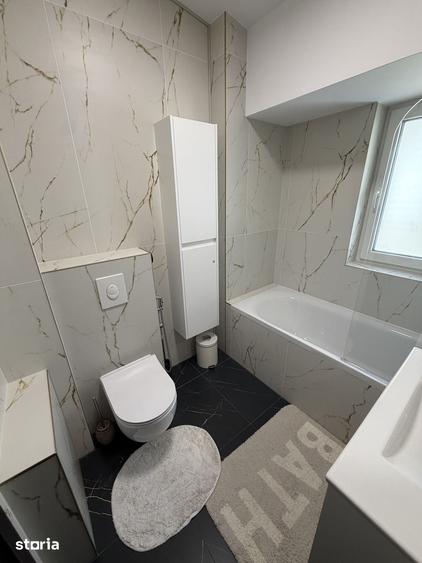 Apartament cu 3 camere în Podu Roș