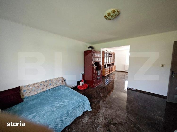 Casă cu 4 camere cu Teren 500 Mp în Lețcani