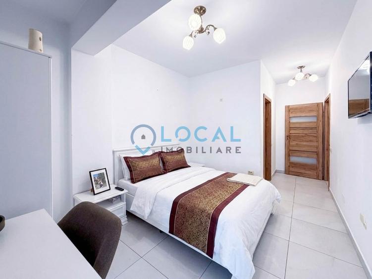 Apartament cu 3 camere semidecomandat, mobilat în Central